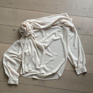 Sheer blouse with brooch